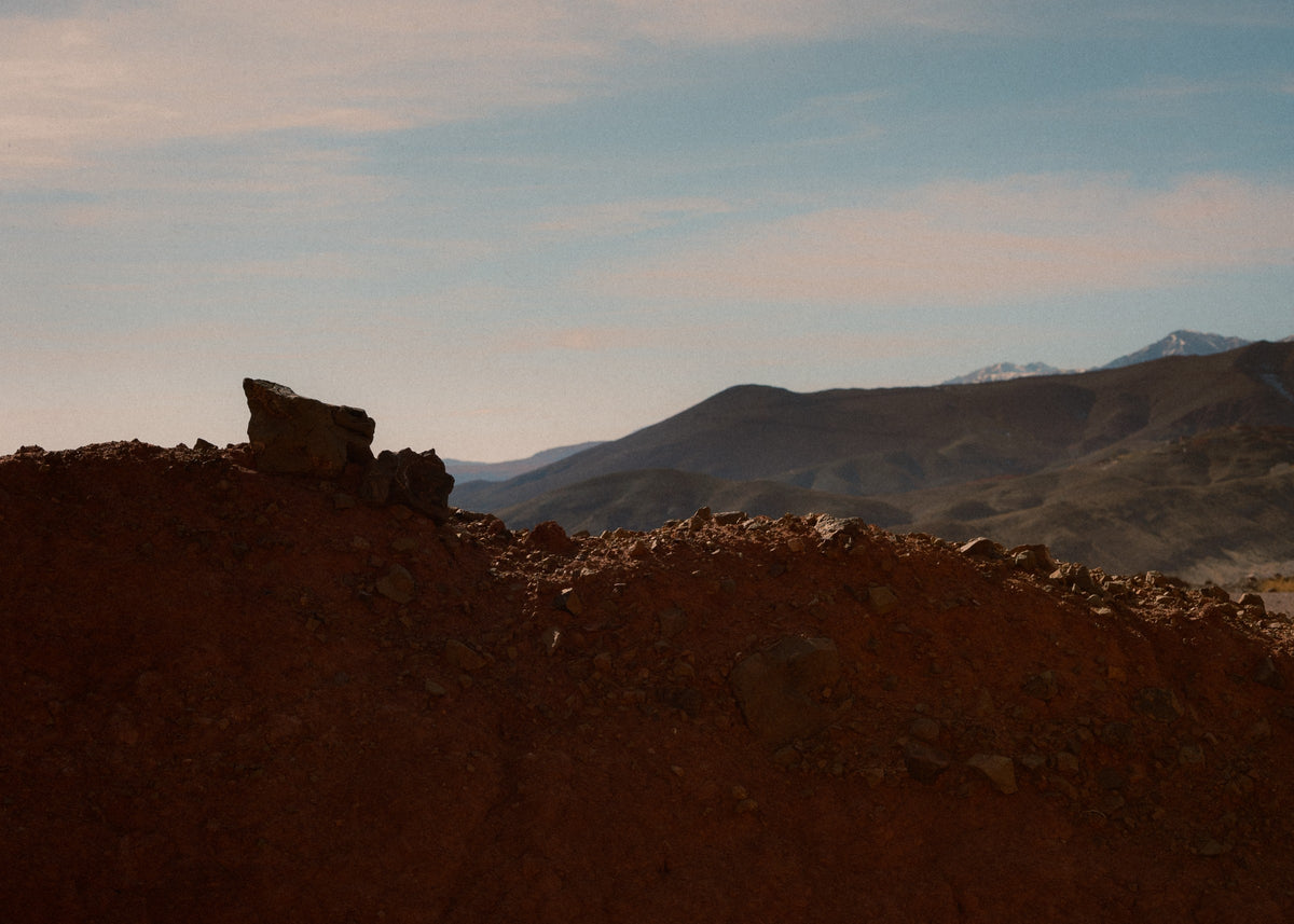 Red earth and hazy mountains