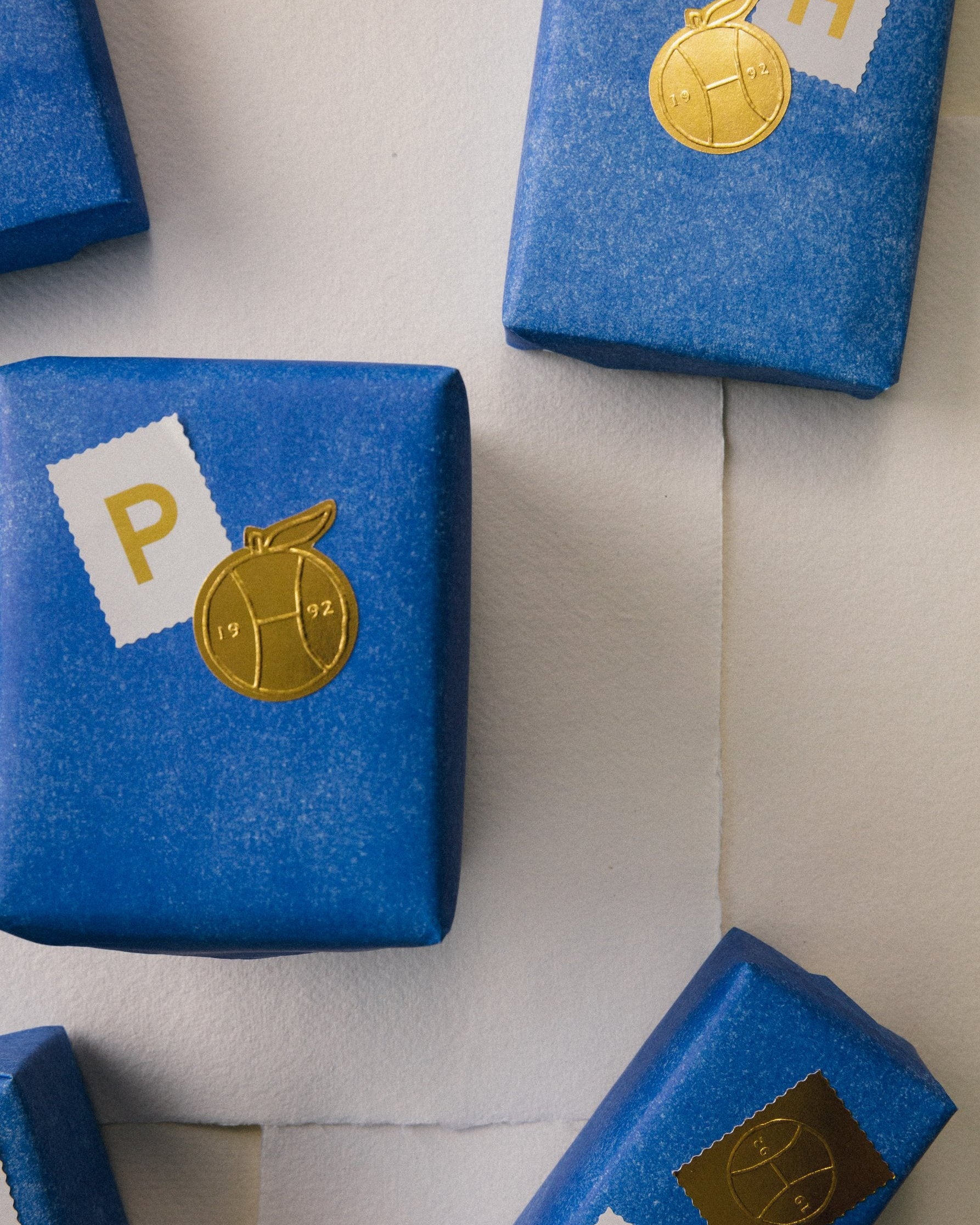 Ink on Paper: gifts wrapped in blue paper