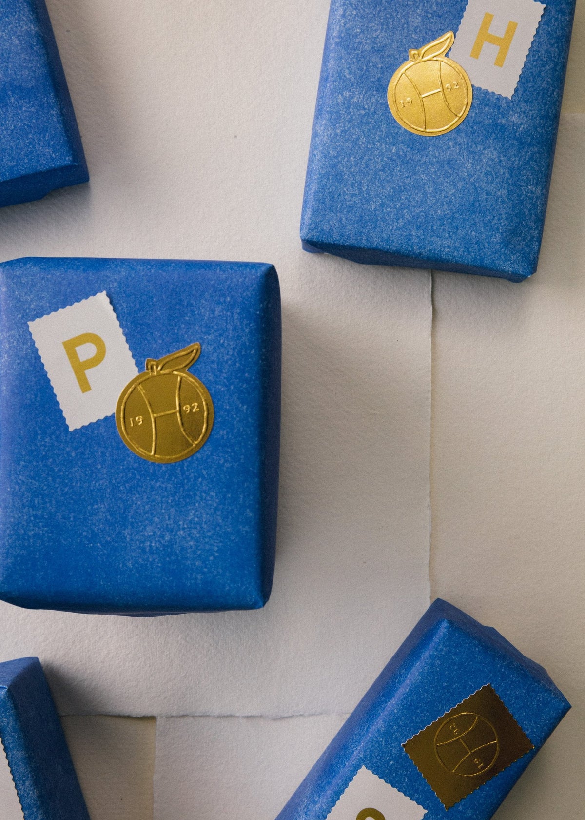 Ink on Paper: gifts wrapped in blue paper