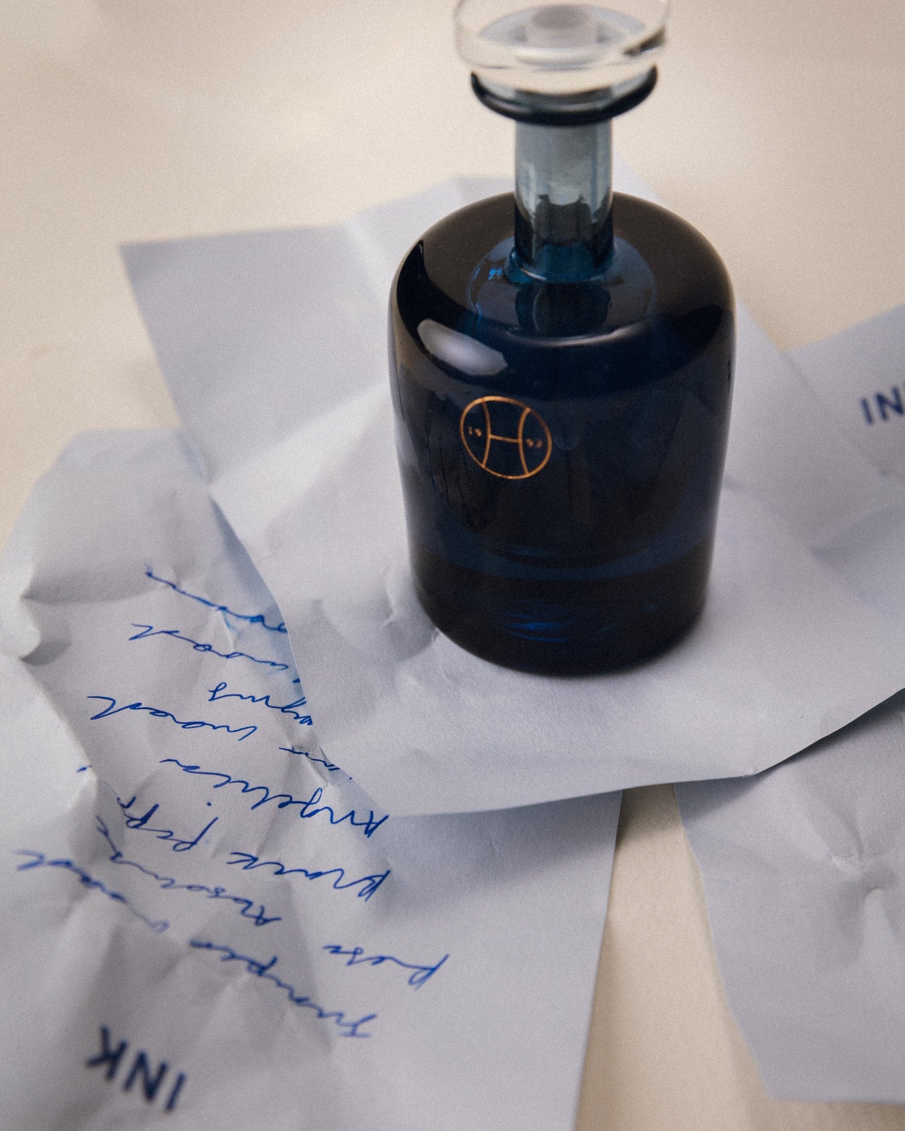 Ink on Paper: handblown Ink bottle on letters
