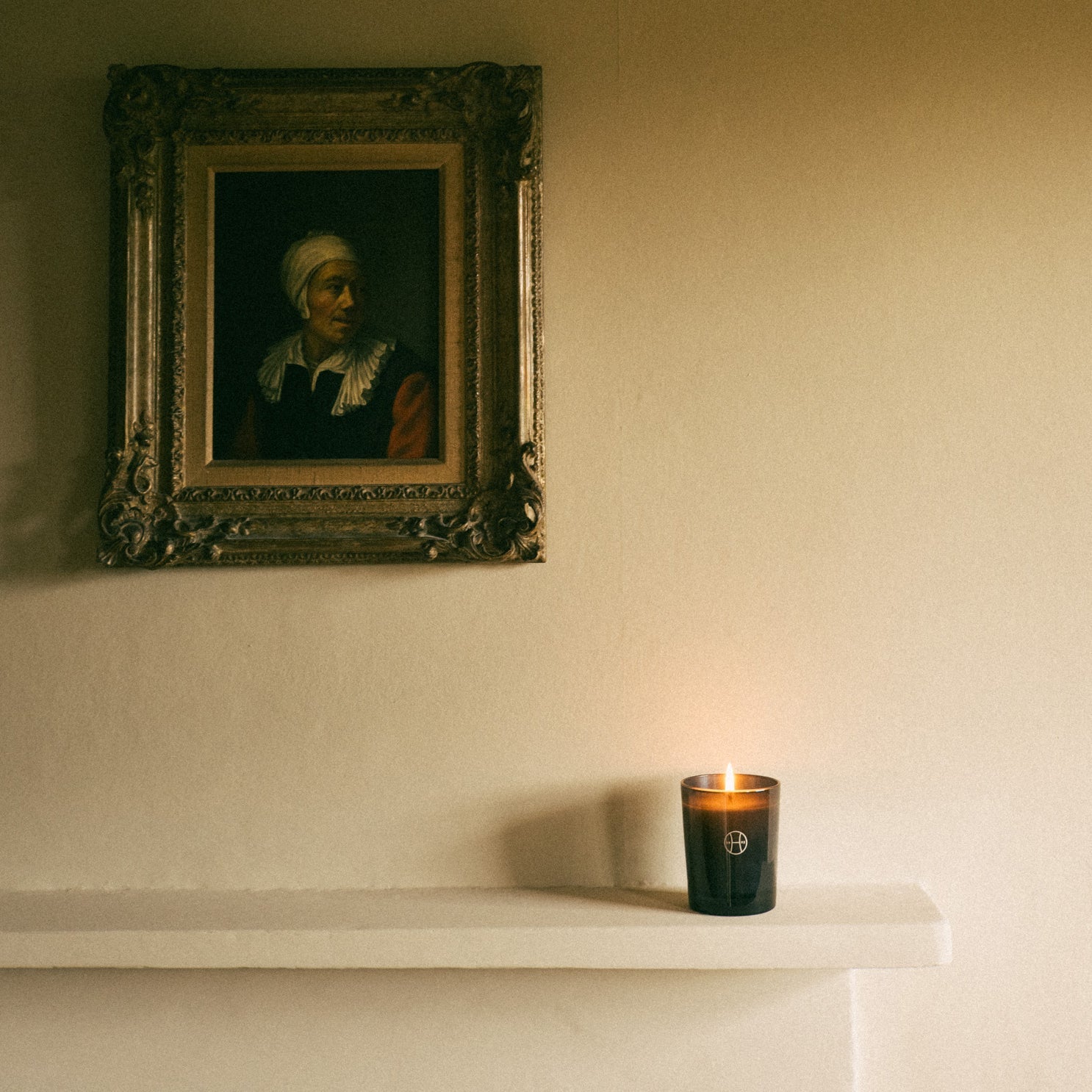 175g candle on a mantelpiece