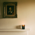 175g candle on a mantelpiece