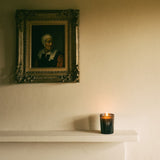 175g candle on a mantelpiece